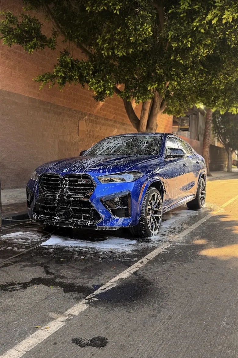 Blue BMW X6 M exterior detail